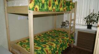 Гостиница Podsolnuh Hostel Волгоград Кровать в общем четырехместном номере для мужчин и женщин-2